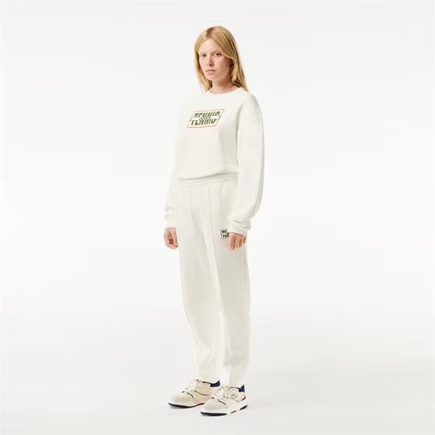219382-lacoste-pleated-trackpants-1.jpg