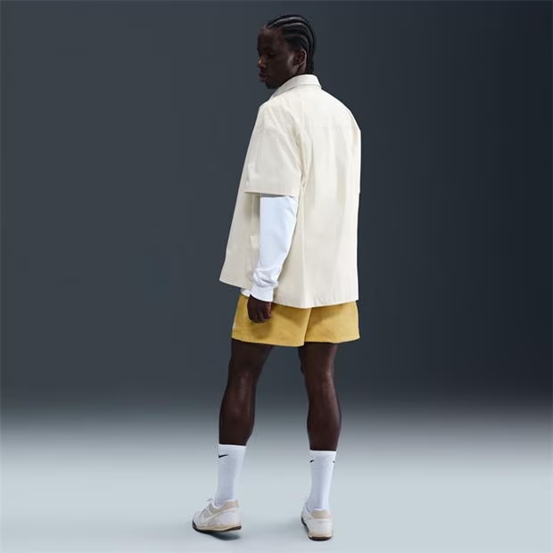 238876-nike-sportswear-essentials-men-s-woven-flow-shorts-1.jpg